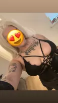 Busty Tatted Young Escort